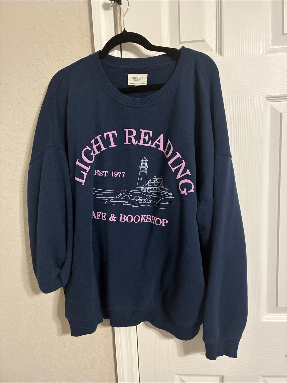 American Eagle Outfitters Navy Sweatshirt with Pink 'Light Reading' Graphic